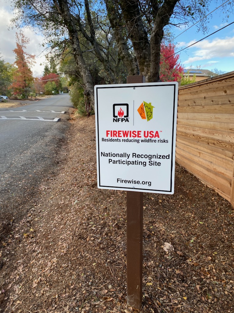 Photo of FIREWISE USA sign on Sierrama Drive in El Dorado County, California.